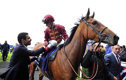 Sheikh Fahad Al Thani greets Andrea Atzeni and Simple Verse after their win 