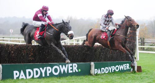 Toushan (right) and Nickname Exit are in the air together at the last