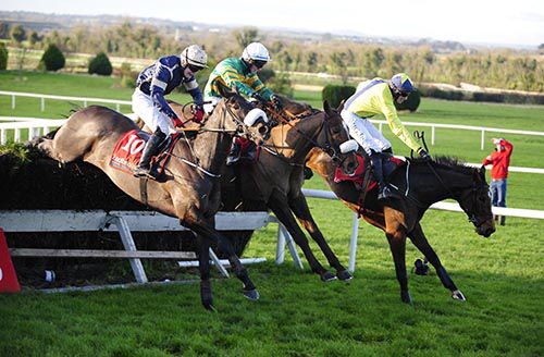 Riverside City and Jack Kennedy (centre) jump the last alongside Georges Conn and about-to-fall Ballychorus 