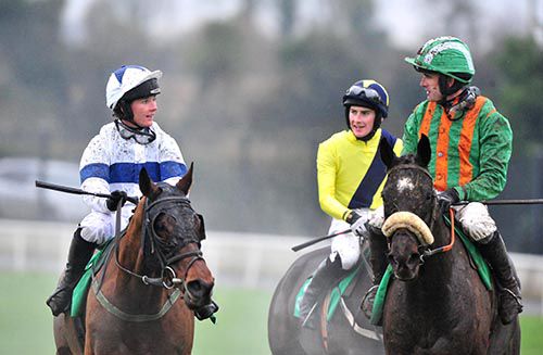 Katie Walsh, left, congratulated by her brother Ruby, right