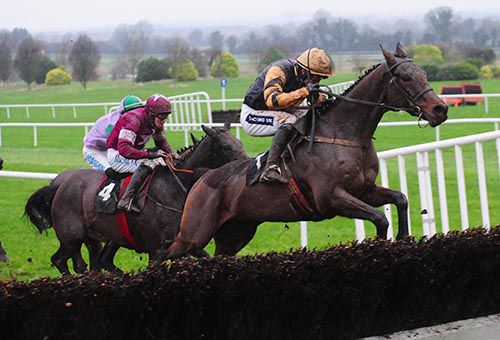 Felix Yonger jumps the last in front under Ruby Walsh
