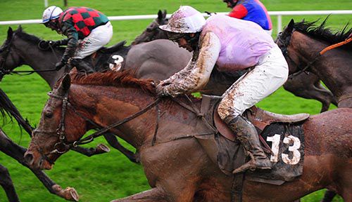 A mud splattered Augher Castle and Helen Mooney pictured on their way to victory