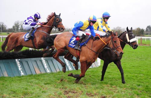 Winner Flemenstorm (hood, Robbie Colgan) closes down on Golan Lodge (near) and Railway Tommy