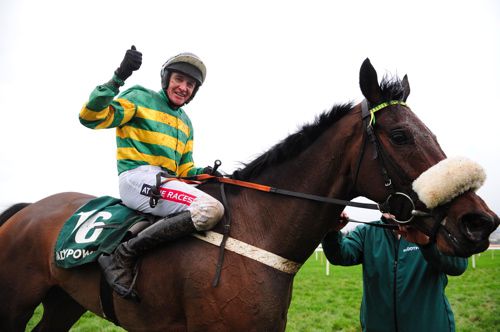 Barry Geraghty celebrates after winning the Paddy Power Chase on Minella Foru