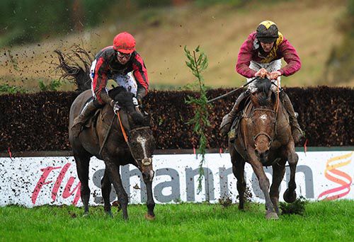 Winner Bothair Clei (right) and Montana Slim jump the last