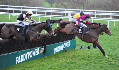 Don Poli leads Foxrock (farside) and On His Own (nearest) over the last