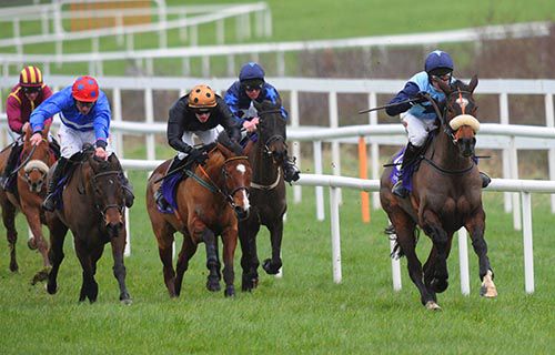 Pride Of The Braid (left, red cap) is about to pass leader Billy's Hope (right)