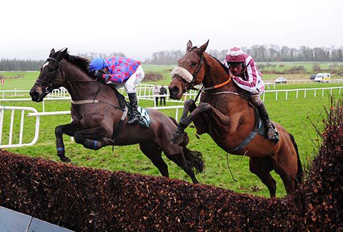 My Murphy and Robbie Power jump ahead of Mala Beach and Davy Russell (nearside)