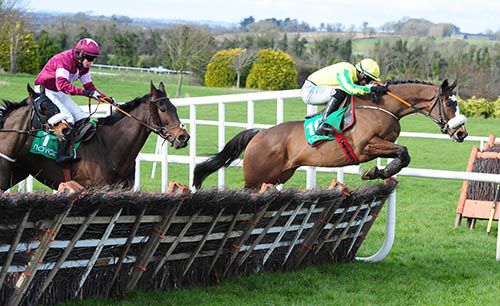 Automated (Jack Kennedy) leads from Alamein with Stuccodor (blinkered head just in shot)