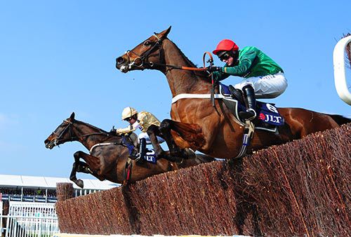 Black Hercules and Ruby Walsh (far side)