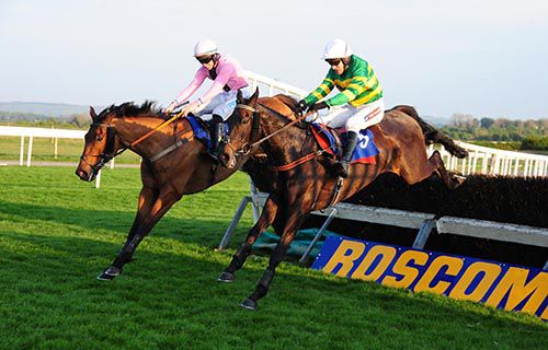 Rebel Cry (inside) and Sir Abbot clear the last together