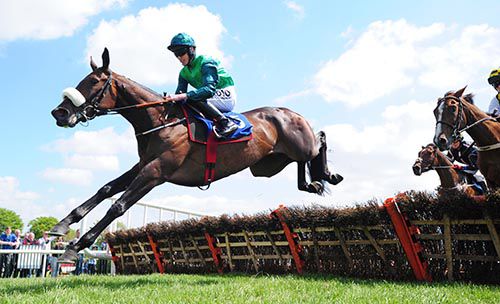 Missy Tata and Jack Kennedy pictured on their way to victory