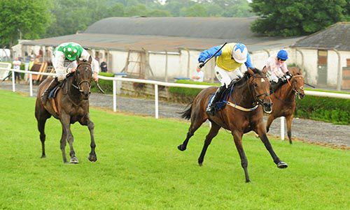 Khalessi (Barry O'Neill) beating Robyn Belle (left)