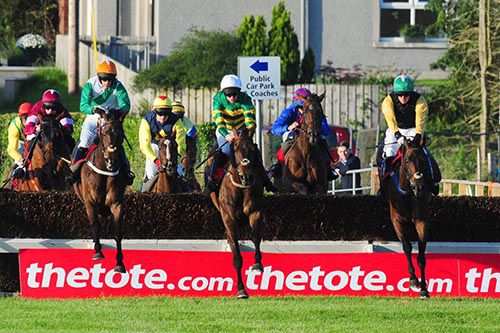 From left to right; Knockanarrigan, Elegant Statesman and Shantou Flyer jump the second last together