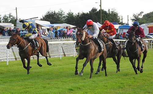 Heist (cheekpieces) and Adrian Heskin pictured on their way to victory