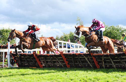 Jack Slade (white cap) and Georgie jump the last together