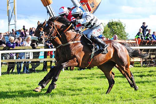 Sir Jack Yeats (nearest) is ridden out by Jonathan Moore to beat Duke Cass