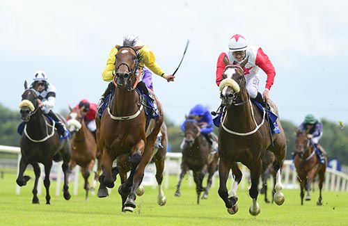 Not A Whisper and Leigh Roche (left)