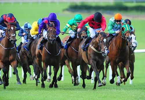 In red and black Gary Carroll leads them home aboard Three Bells