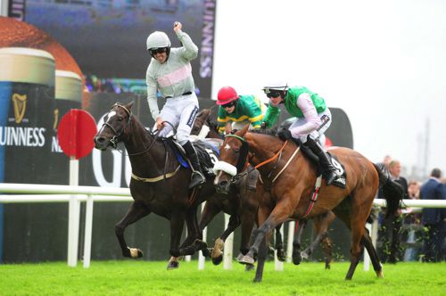 Ruby Walsh celebrates as Clondaw Warrior wins the Guinness Galway Hurdle