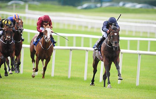 Intelligence Cross (Seamie Heffernan) strides clear to win the Round Tower Stakes