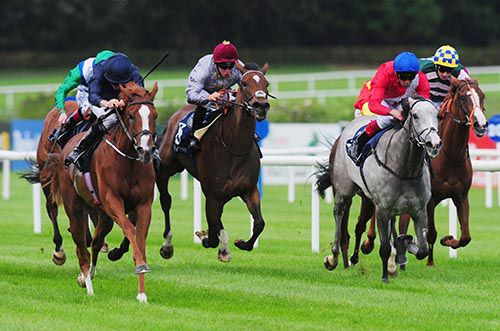 Alice Springs (white face) comes through to win under Ryan Moore