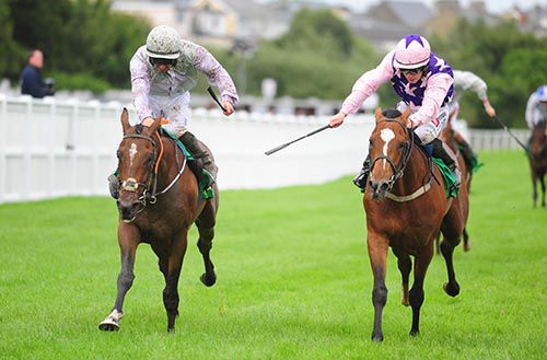 Famous Milly (left) winning on the Flat at Listowel