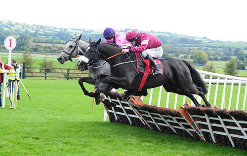 Fire In His Eyes and David Mullins (near) jump the last