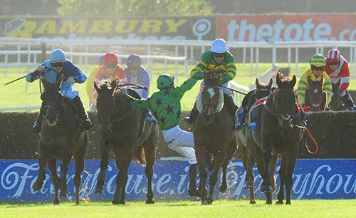 Irish Bulletin (cheekpieces) leads away from the last, as Shane Crimin is unseated from Is That Marmalade 