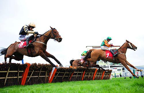 Nichols Canyon (Ruby Walsh, nearside) chases down Lil Rockerfeller and Trevor Whelan