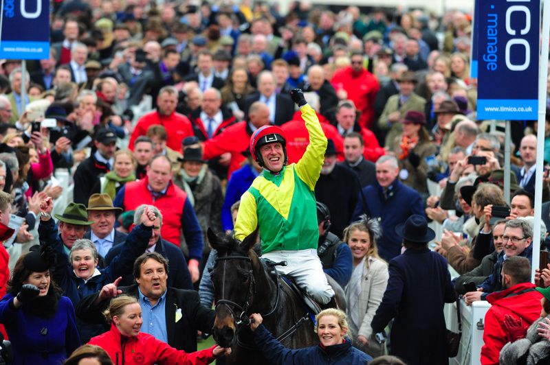 Sizing John pictured returning to the winners enclosure
