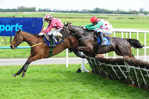Winner  Drumconnor Lad (Davy Russell) chases down Tamlough  Boy (Sean  Flanagan)