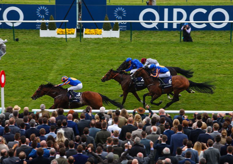 Barney Roy, blue, chases home Churchill