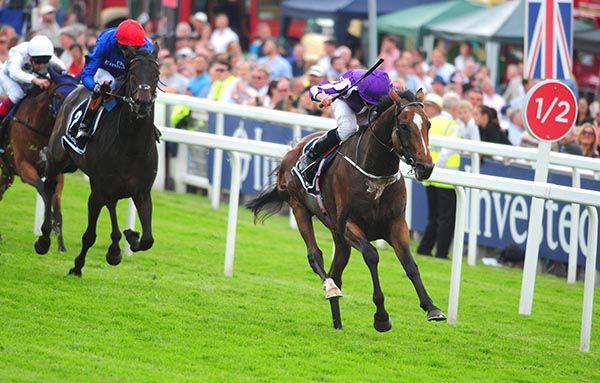 Ryan Moore and Highland Reel in charge at Epsom