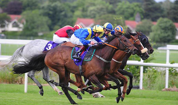 Poitin delivers the decisive finishing kick down the outer under Robbie Downey