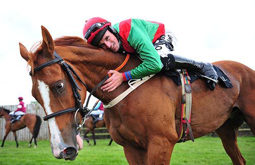 Sean Flanagan shows his admiration for Rashaan after winning the third at Down Royal