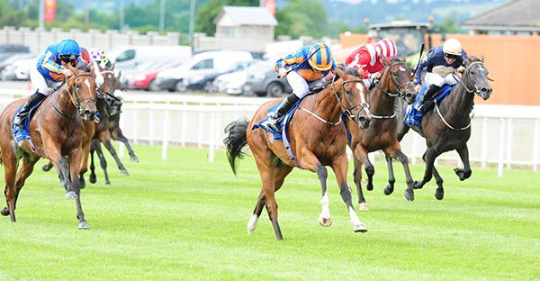 Clemmie and Ryan Moore win the Grangecon Stud Stakes 