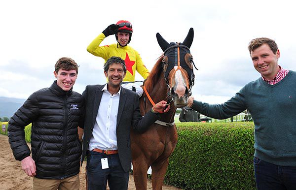 The Kennedy brothers (left to right: Jack, Sean, Paddy & Michael) with Touch Of Gold after her win in the second