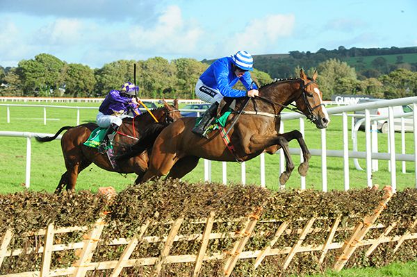 Ben Button (Ruby Walsh) leads over the final flight