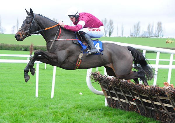 Trainwreck and Davy Russell clear the last