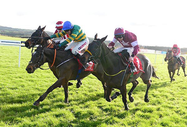 Blue cap Barry Geraghty won the opener at Punchestown on Spades Are Trumps 