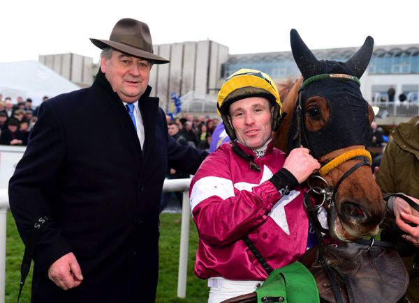 Road To Respect pictured with Noel Meade and Sean Flanagan after winning at Leopardstown last Christmas