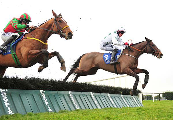 Winner Commentariolus (Keith Donoghue, right) jumps the last with eventual 2nd placer Free Ranger (Sean Flanagan, near)