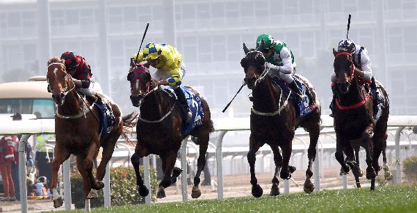 Pakistan Star (green cap) finishes a close fourth behind Time Warp (left) in the Citi Hong Kong Gold Cup