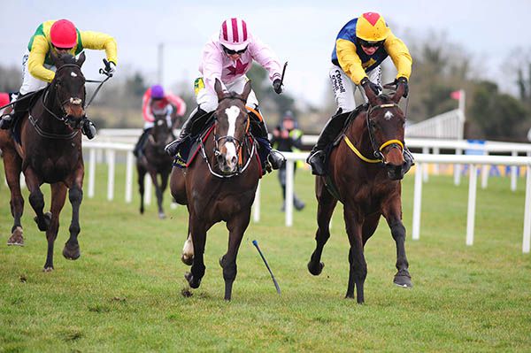 Nina Carberry, right, loses her whip but guides Pat's Pick home in Fairyhouse