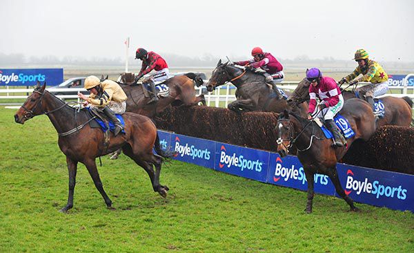Bellshill leads over the last, with General Principle (red cap) in the chasing pack