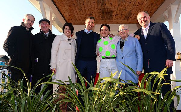 Katie Walsh pictured with her family after announcing her retirement when winning on Antey