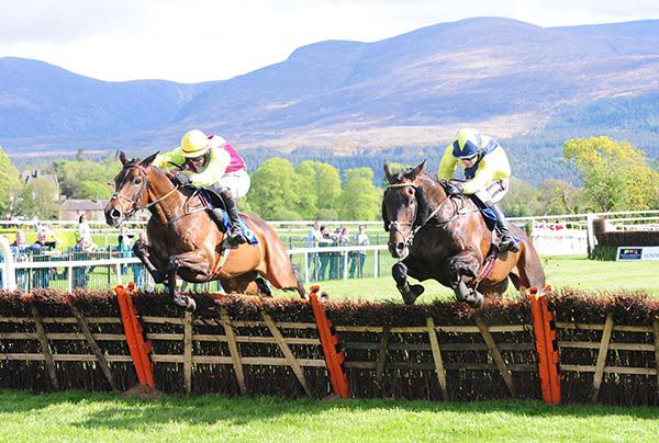 Eamon High, left, jumps the last with As You Were