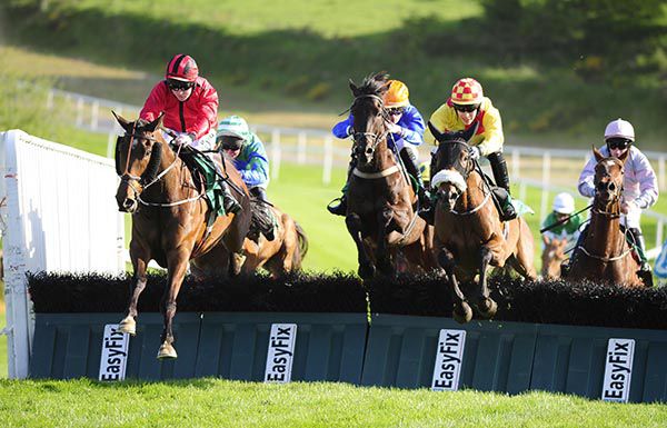 Two In One (red) jumps the last under Luke Dempsey