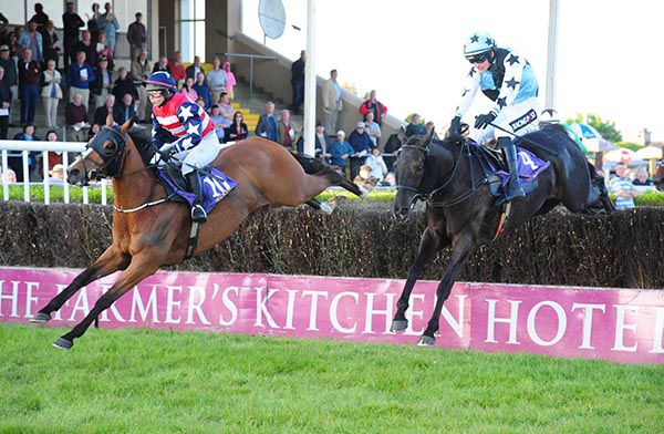 Bakers Street (left) and Dark Outsider jump the last fence